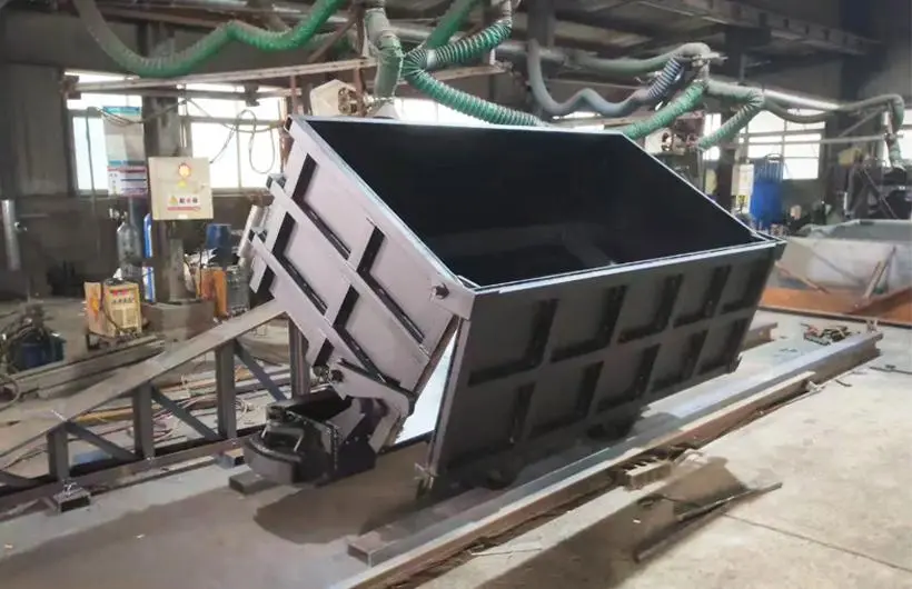 Drop-bottom mine car